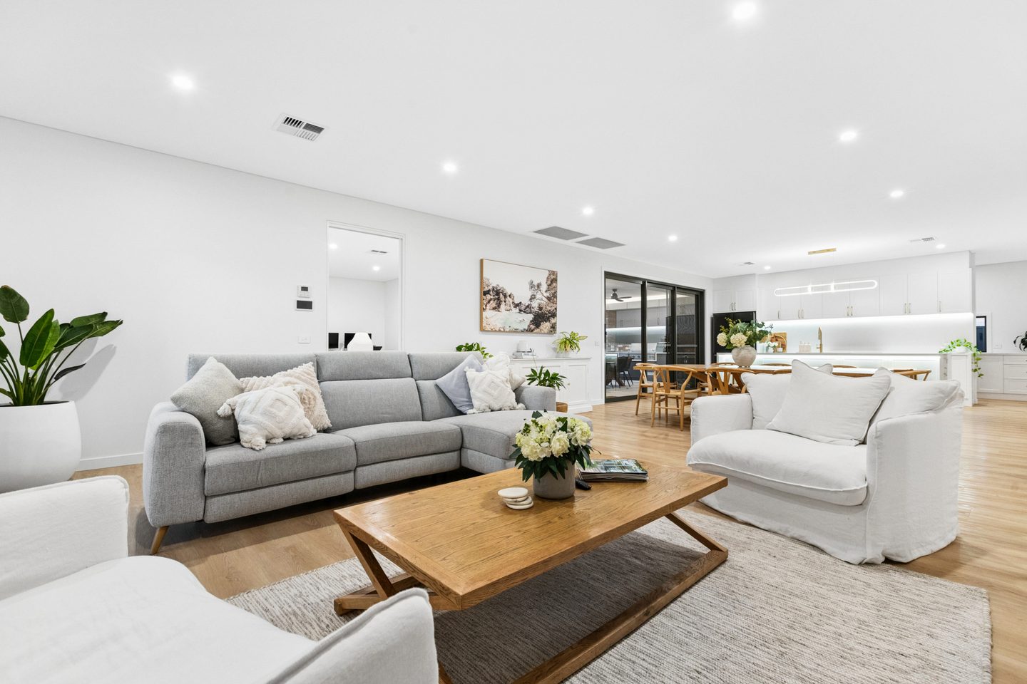 Open-plan living space looking through to the kitchen