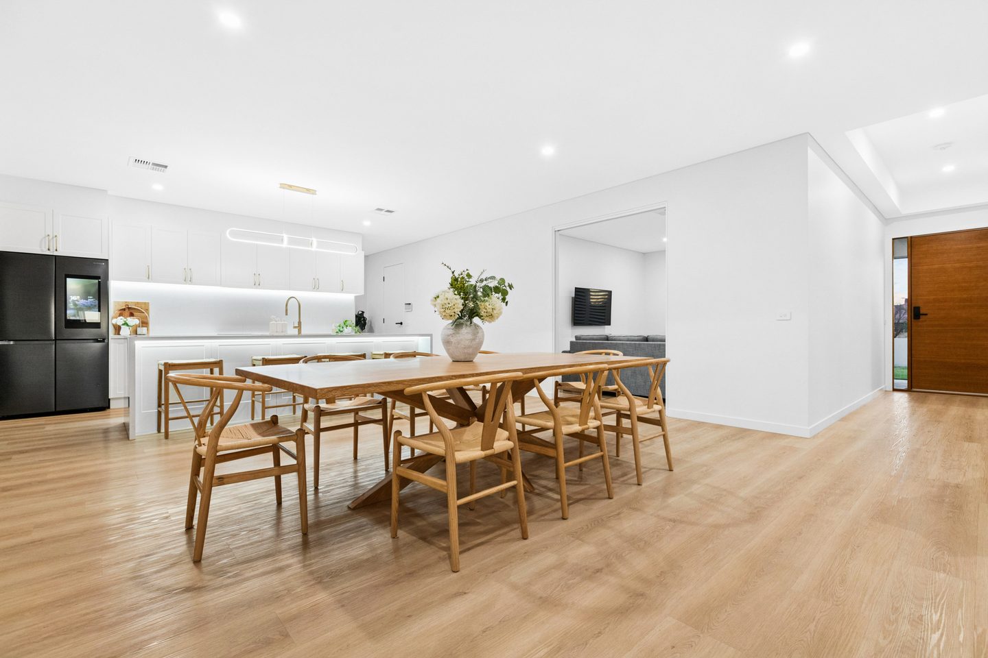 The dining area and entry beyond