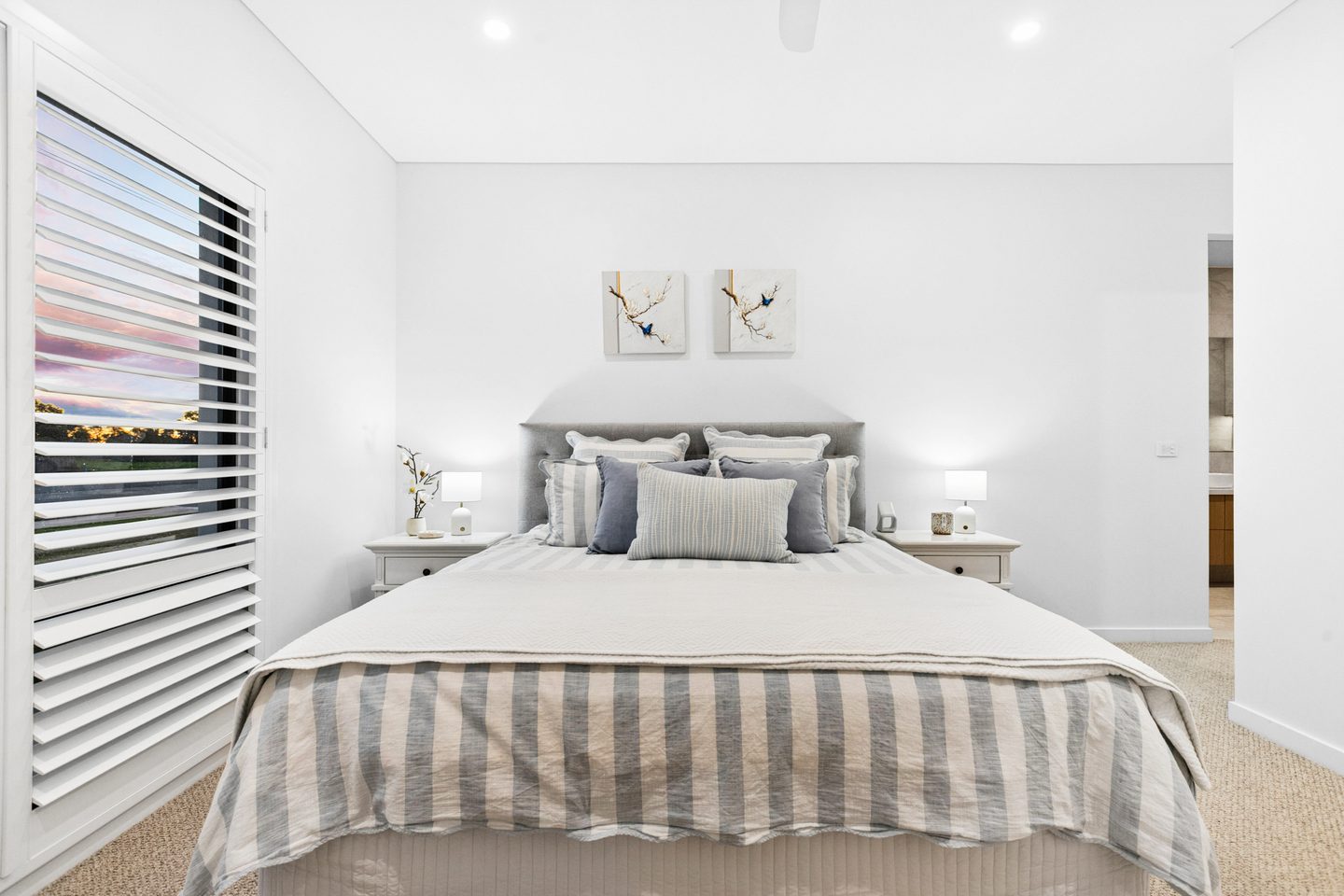 The main bedroom and ensuite beyond