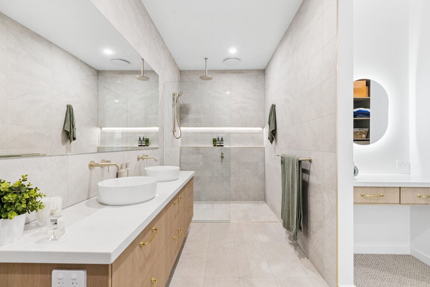 Main ensuite with stone benchtop, twin basins and walk-in shower